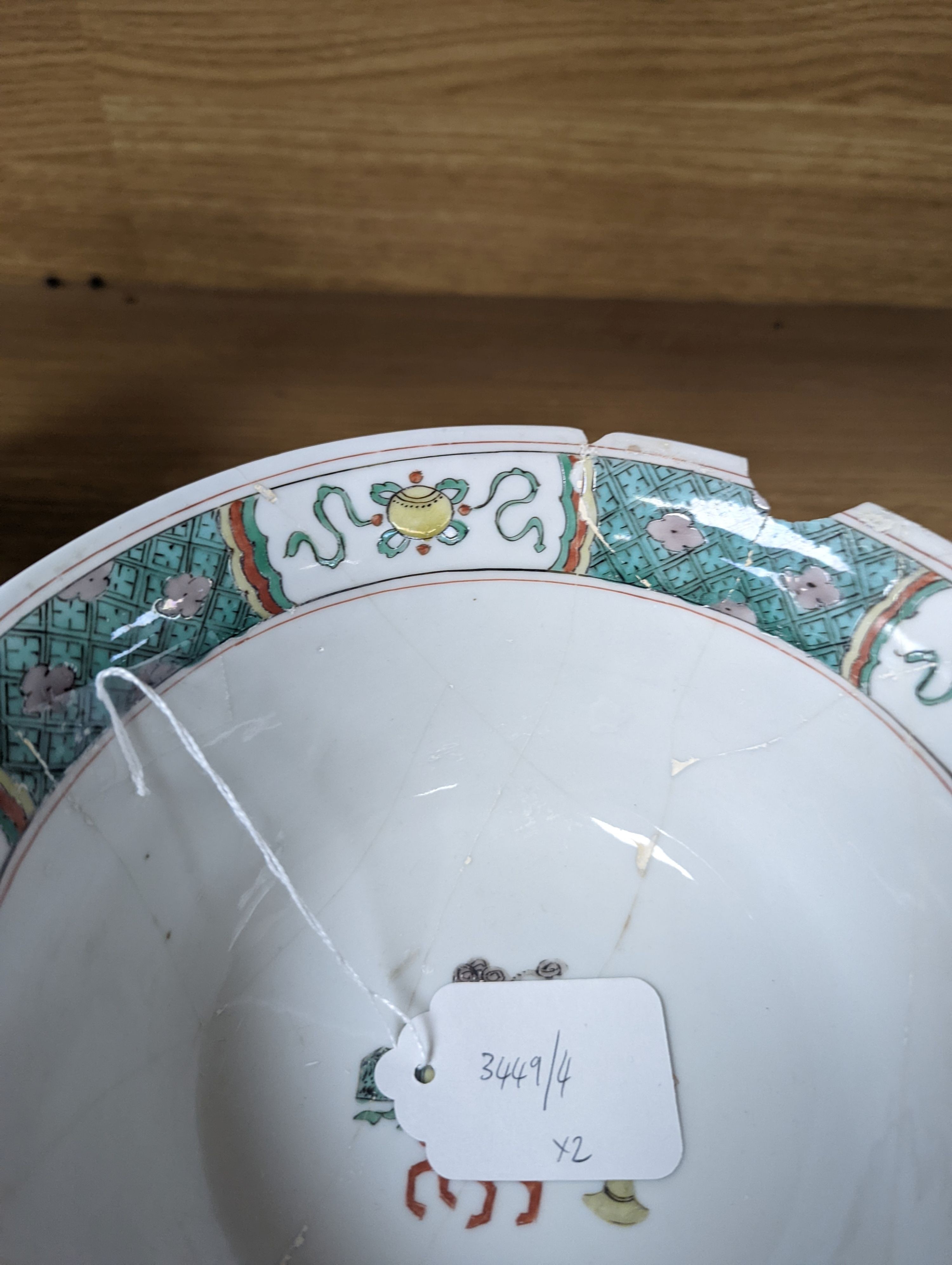 A Kangxi famille verte bowl, 20cm (a.f.) and a Chinese Dowager Empress-pattern pillow with dragons